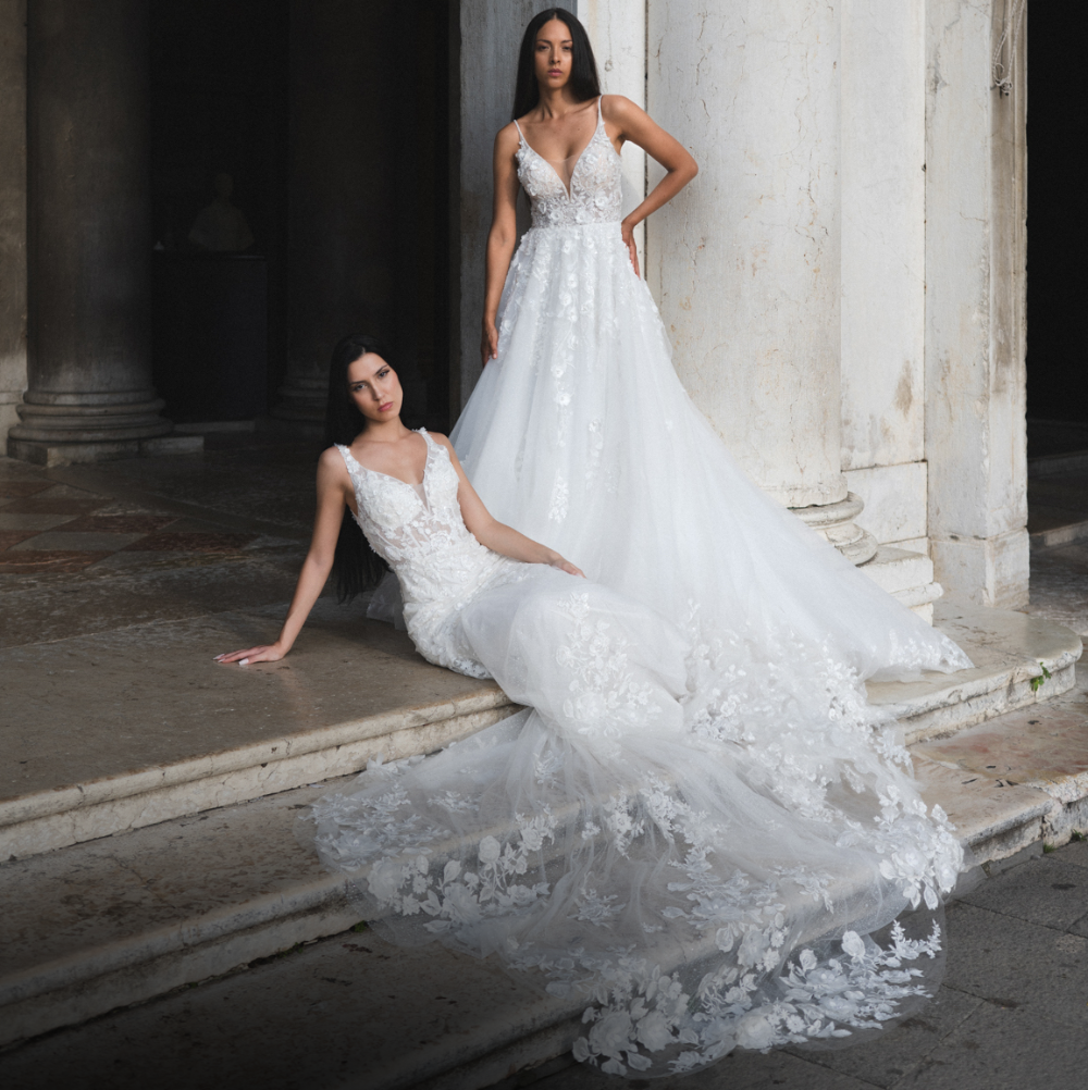 Models wearing a gown by Randy Fenoli