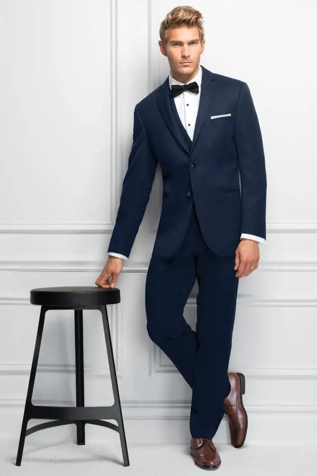 Model wearing a black suit